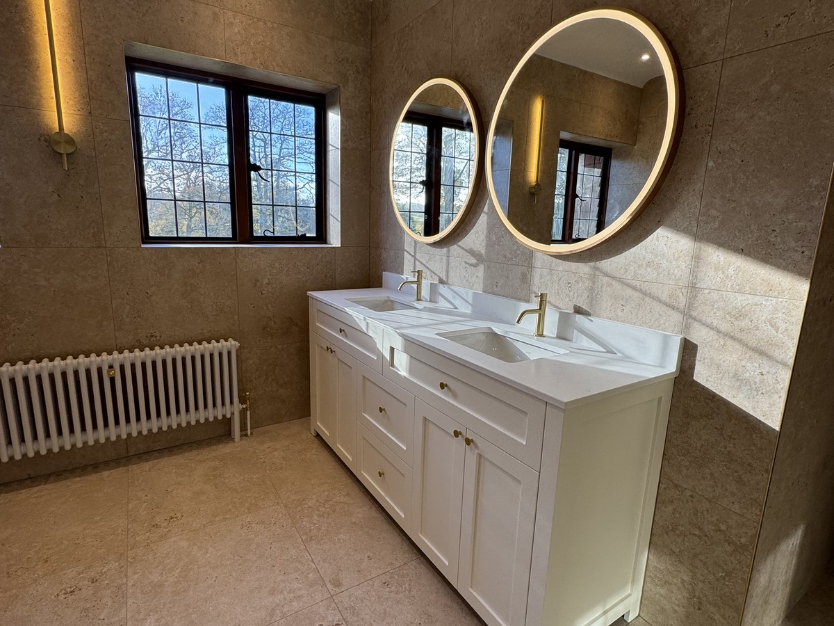 Fully tiled family bathroom in Farnham by Gary James