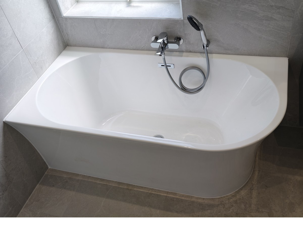 Walk-in shower and freestanding bath fitted in Godalming