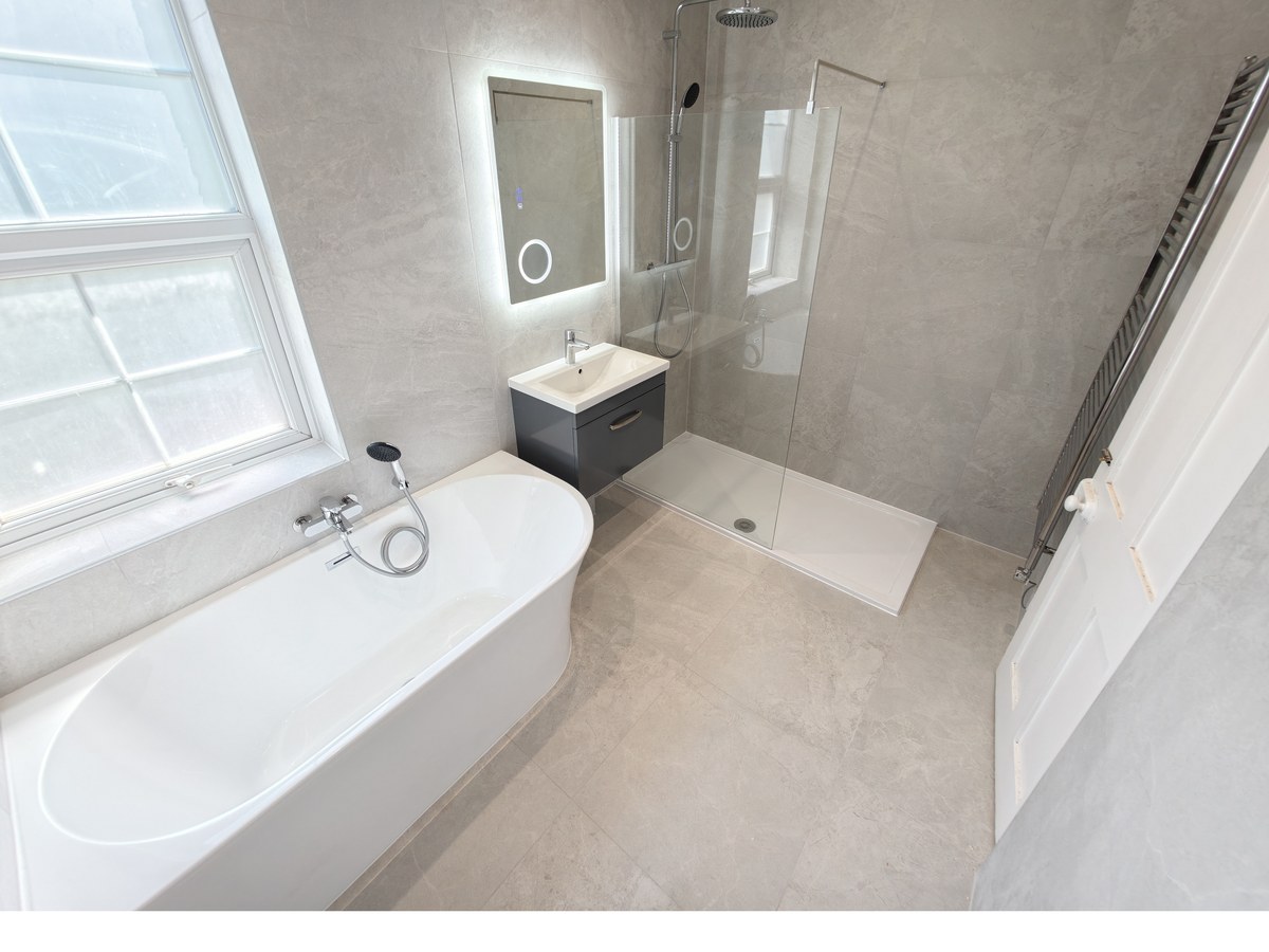 Walk-in shower and freestanding bath fitted in Guildford