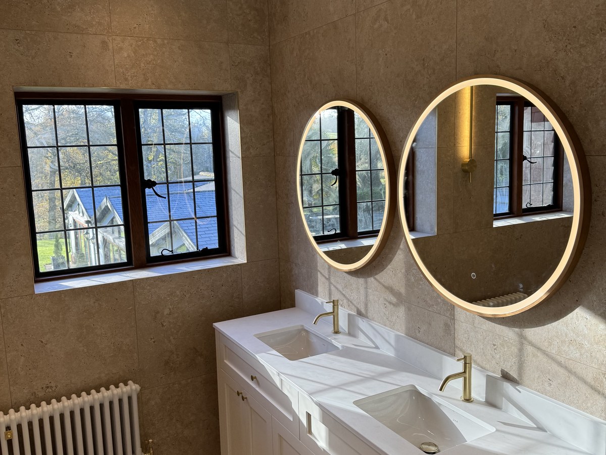 Fully tiled family bathroom in Guildford by Gary James